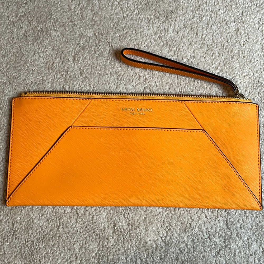 Henri bendel orange leather clutch